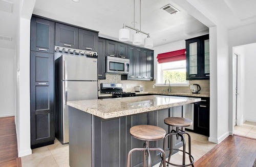 Westchester House | Luxe Westchester 4BR w/Backyard & W/D, near Shops & Bars, by Blueground