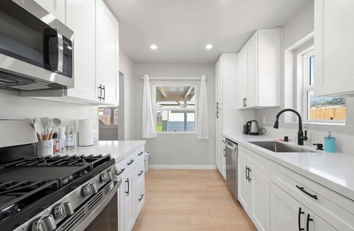 Monrovia House | Luxury Modern Retreat with Spacious Yard & Premium Comfort