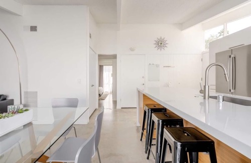 Racquet Club Estates House | Mid-century Alexander w Heated Saltwater Pool/Spa, Tesla Charger