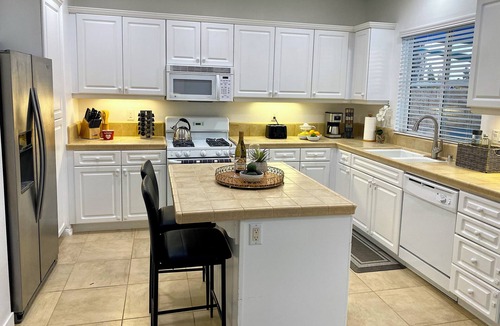 Midway House | Modern cozy comforts 4BR 2.5BA home, 2-car garage, outdoor space, monthly rental