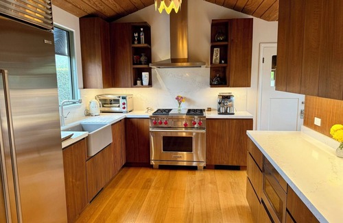 North of Wilshire House | New listing! 3 bd Spanish gem in Brentwood with courtyards & front/back yards.