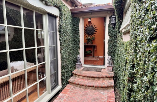 North of Wilshire House | New listing! 3 bd Spanish gem in Brentwood with courtyards & front/back yards.