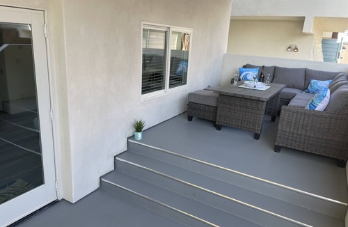 The Strand House | New ocean front duplex, walk to dining, shops & entertainment.