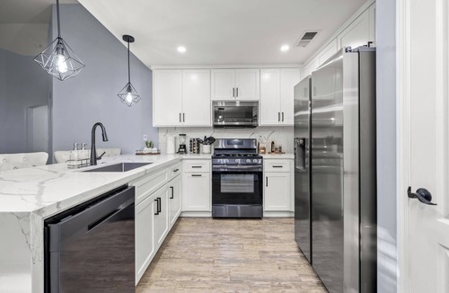 Greenacres House | Newly Furnished Home in Safe Quiet Neighborhood with Pool Near Shops & Dining