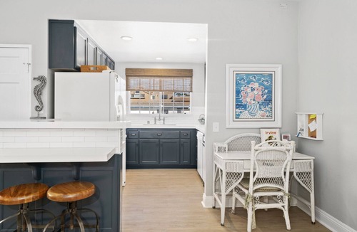 West Newport Condo | Newly renovated Duplex steps to the sand 3bd/4bath