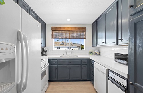 West Newport Condo | Newly renovated Duplex steps to the sand 3bd/4bath