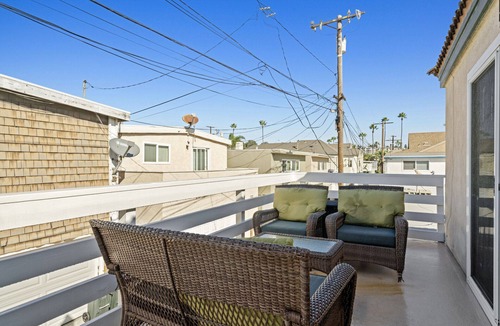 West Newport Condo | Newly renovated Duplex steps to the sand 3bd/4bath