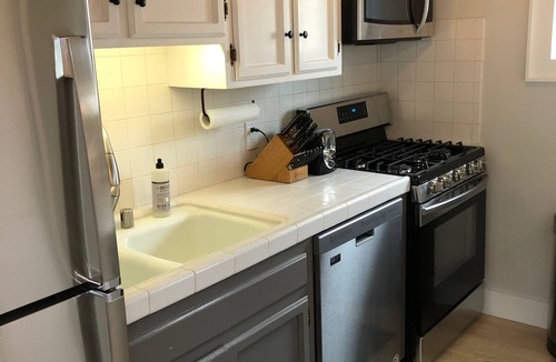 Balboa Island Cottage | Newly renovated, Reserved Parking, Rooftop Deck, HVAC Steps to Bay Beach & Shops