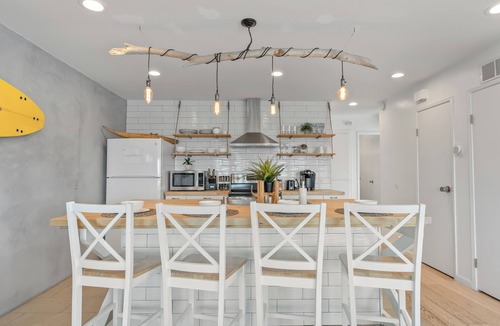 San Clemente Apartment | Ocean View + Deck, Walk to Trestles Beach | El Camino Surfhouse B by AvantStay