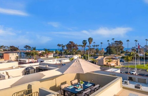 Del Obispo Apartment | Oceanview rooftop deck, pool, hot tub | Doho Haus