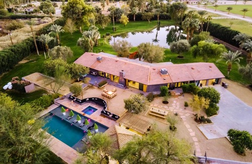 Palm Springs House | Paradiso by AvantStay Pool Lake Fire Pit Billiards Room Elegant Secluded Estate