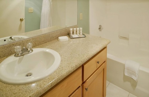 San Diego Country Estates Hotel | Perfect Escape! Four Classy Units, Pool, Tennis Court, Onsite Game Room