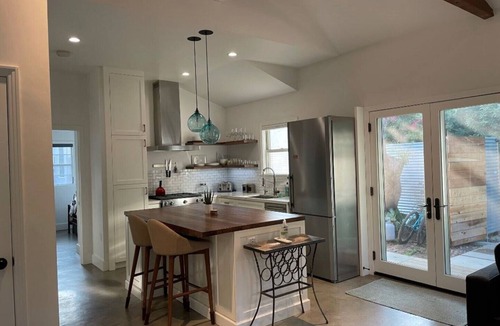 Sunset Park House | Private guesthouse with gated pathway entrance and private yard.