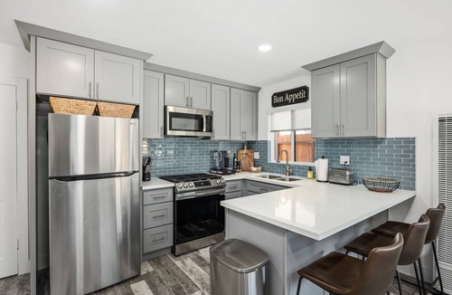 Capistrano Beach House | Sleeps 4 by the beach. Horseshoe and fire pit in private yard.