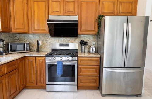 Cypress House | SPACIOUS 4-BEDROOM HOME WITH LARGE YARD AND GARAGE NEAR KNOTT'S BERRY FARM (p67)