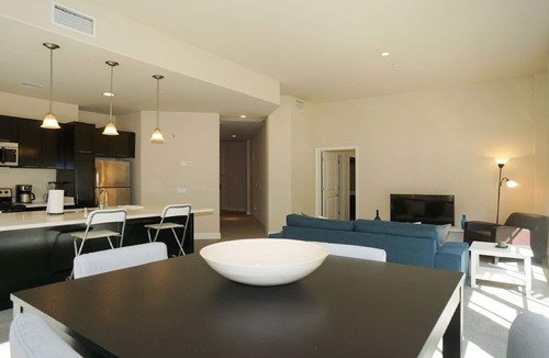 Downtown Apartment | Spacious corner suite with patio +private balcony with direct pool access!