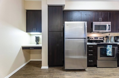 Santa Ana Apartment | Spacious Home in South Coast - 1Mi to South Coast Plaza & Irvine - Gym+Pool & EV