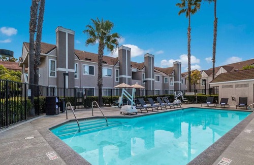 Downtown Village House | Spacious Three 2BR Units w/ Kitchens! w/ Onsite Pool, BBQ & Sports Facility!