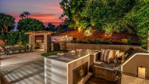 Mission Viejo House | Spanish-Inspired Mission Viejo Home with Courtyard Firepit Backyard Dining Casa Cordero by AvantStay