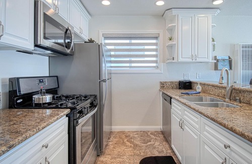 Santa Ana Heights Condo | Spectacular oceanfront upper unit with amazing views from awesome roof top deck!