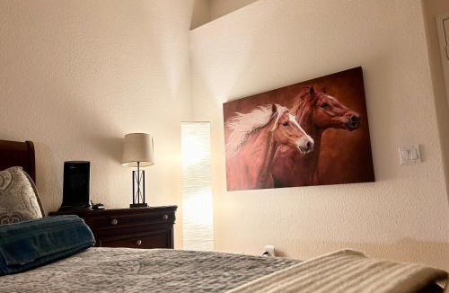 Hemet House | Stallion Crest Suite with TV and private bathroom