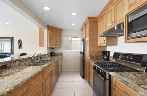 Balboa Peninsula Condo | Stay on the Oceanfront | Coveted Pier-to-Pier Location | Walk to it All (upper level unit)