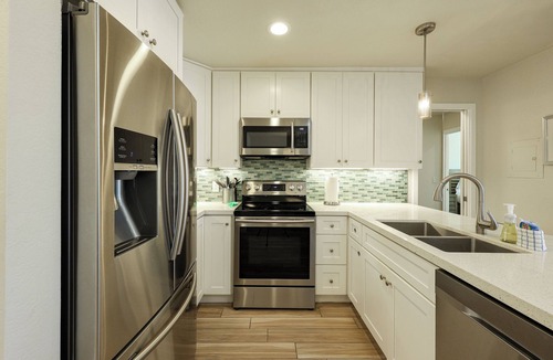 Townsite Condo | Stunning Ocean, Pool, and Garden views from Beautifully Appointed Unit!