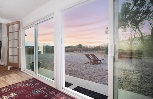 Morongo Valley House | Stylish Morongo Valley Retreat. Pond/waterfall views all around, fenced for dogs