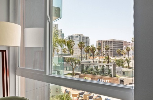 East Village Apartment | Sunlit Long Beach 1BR w/Pool & Gym, walk to Ocean Blvd, by Blueground