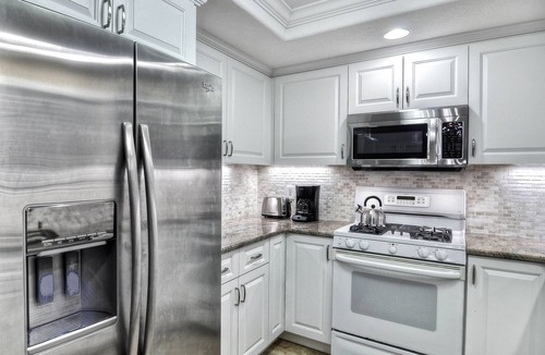 San Clemente Condo | Sunny condo with loft and spacious patio surrounded by palm trees