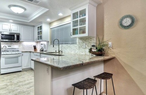 San Clemente Condo | Sunny condo with loft and spacious patio surrounded by palm trees