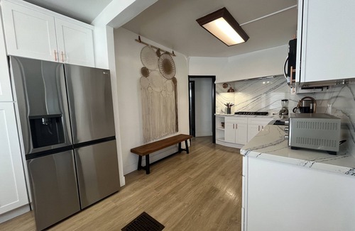 Downtown Riverside House | The Charming House of Riverside: All King beds, 55" Smart TVs, W/D, Downtown