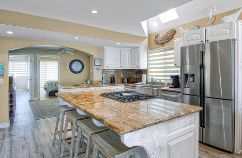 Balboa Peninsula House | Three stories of WOW await you! This spectacular private home is one of a kind!