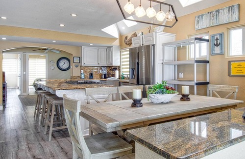 Balboa Peninsula House | Three stories of WOW await you! This spectacular private home is one of a kind!