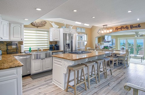 Balboa Peninsula House | Three stories of WOW await you! This spectacular private home is one of a kind!