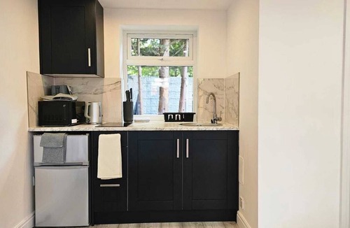 Village Ski Chalet | Tranquil 1-bedroom chalet in charming London for a cozy stay