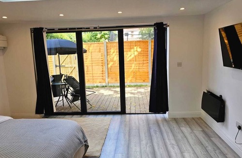 Village Ski Chalet | Tranquil 1-bedroom chalet in charming London for a cozy stay