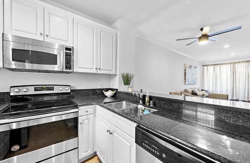 Huntington Beach Condo | Turnkey Surf Designer, furnished Condo with amazing Amenities!