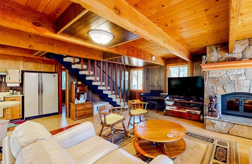 Comstock Acres Cabin | Two-story cabin with a wood fireplace, washer/dryer, & decks