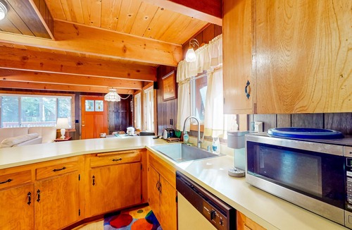 Comstock Acres Cabin | Two-story cabin with a wood fireplace, washer/dryer, & decks