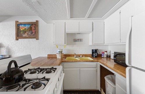 The Village Hotel | Village Suites Inn. Kodiak Bear, Perfect Location in the Village, fully equipped upstairs unit.