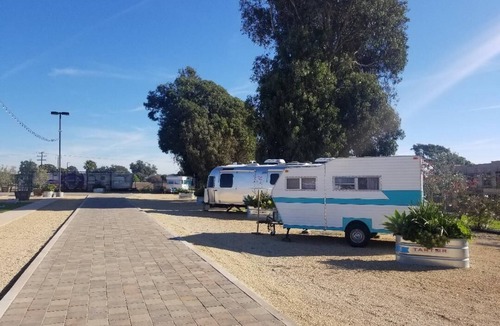 Ventura House | Vintage Camper delivered to your reserved campsite! Near Surf Beach & Downtown