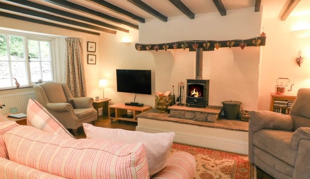 2 STORRS COTTAGES, south-facing patio, in Ingleton