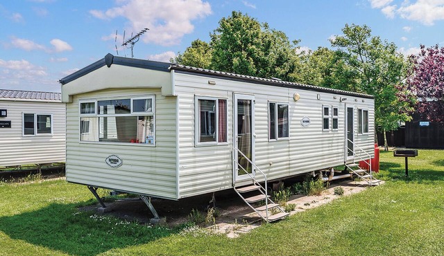 Comfortable 12ft-wide caravan with one double and two twin.