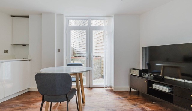 Modern Queens Park 2BR w/Balcony & W/D, nr Food & Bars, by Blueground