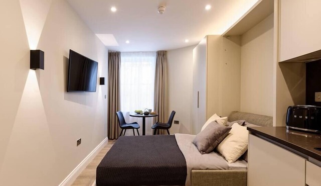 Nice micro studio with Shared bathroom.