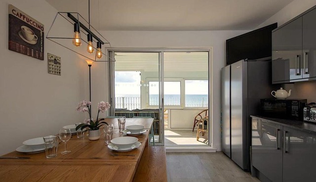 Stunning Beachfront Apt w Balcony & Sea Views