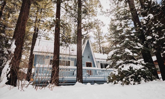 Big Bear Cabin | Hidden Pines Cabin is a 1970's two-story Cabin that features modern upgrades