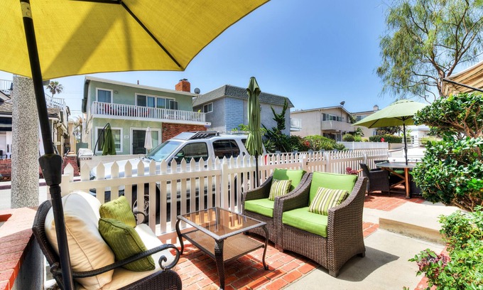 West Newport Condo | Newly renovated Duplex steps to the sand 3bd/3bath