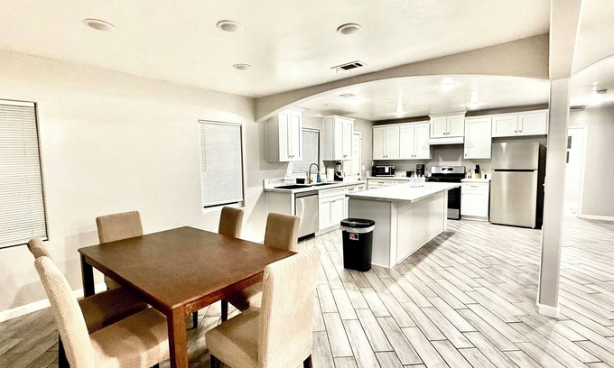 Baker Street House | Spacious 4-bedroom house in charming Bakersfield with AC. 4 queen & 3 twin beds.